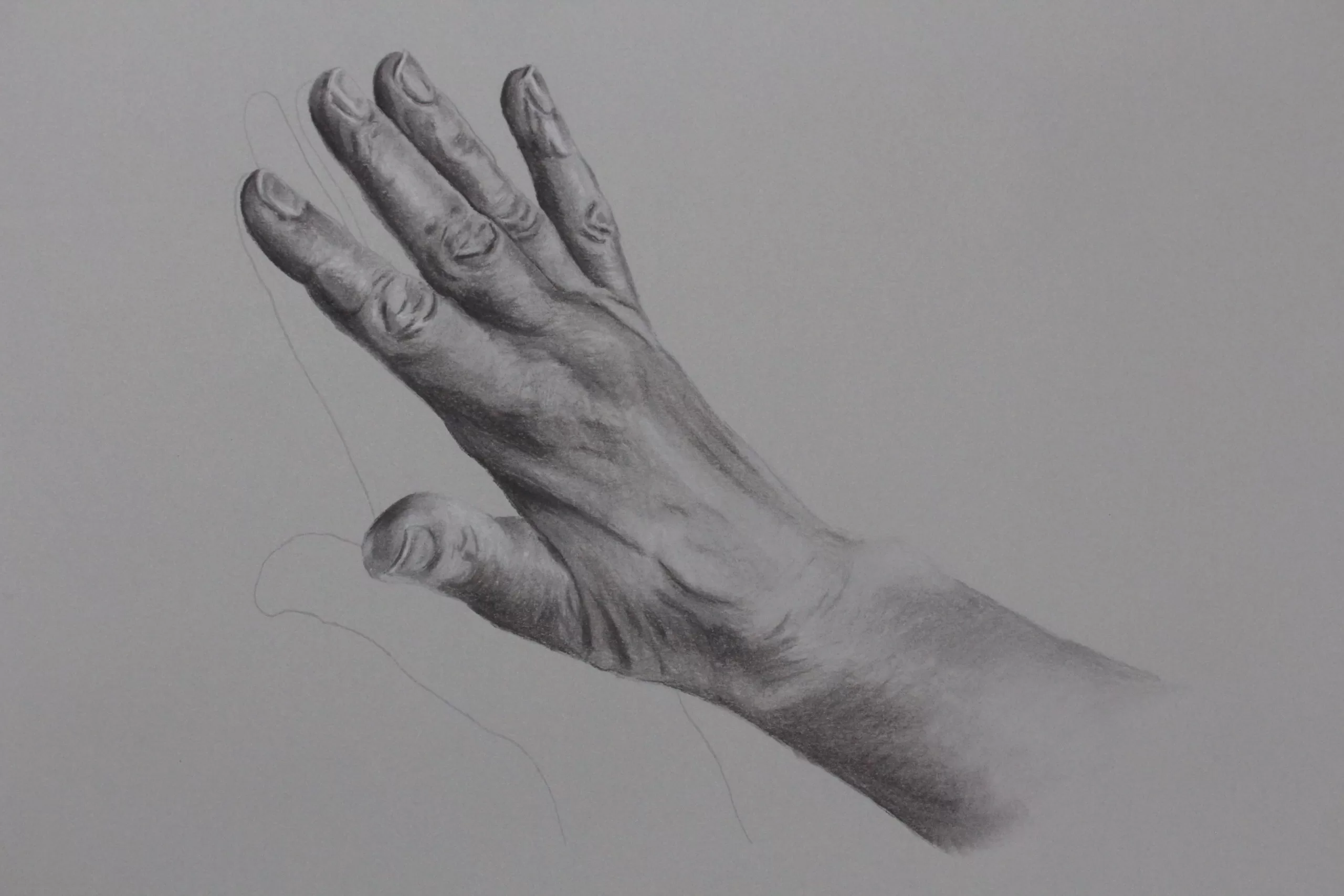 Pencil drawing of hand touching an barely visible reflection by Abi Spendlove